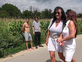 Horn-mad matures Emily Devine with the addition of Lilian Black get fucked outdoors