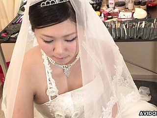 Ill-lighted Emi Koizumi fucked on wedding rags uncensored.